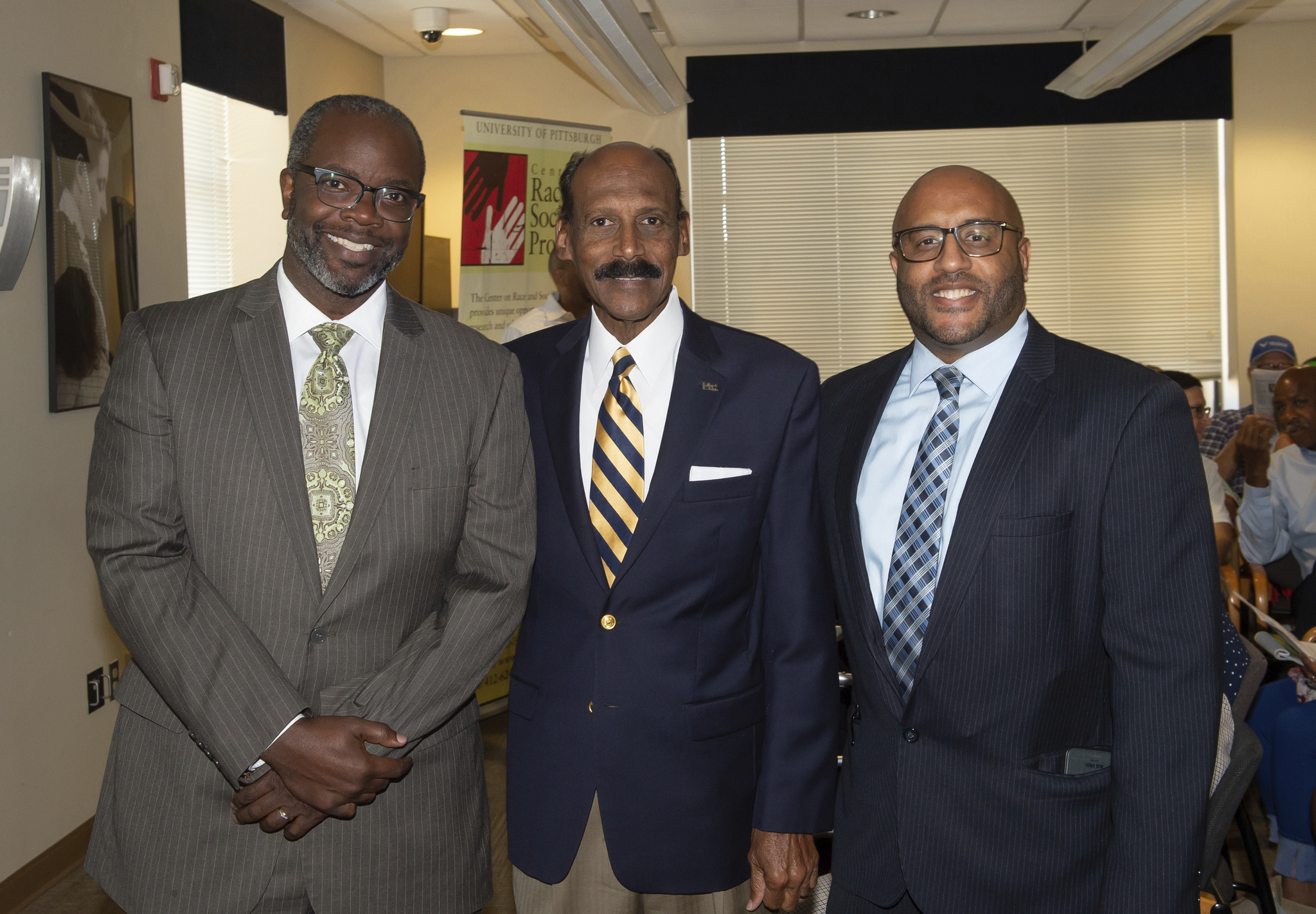 Dean Larry Davis with Vice Provost John Wallace and Dr. James Huguley